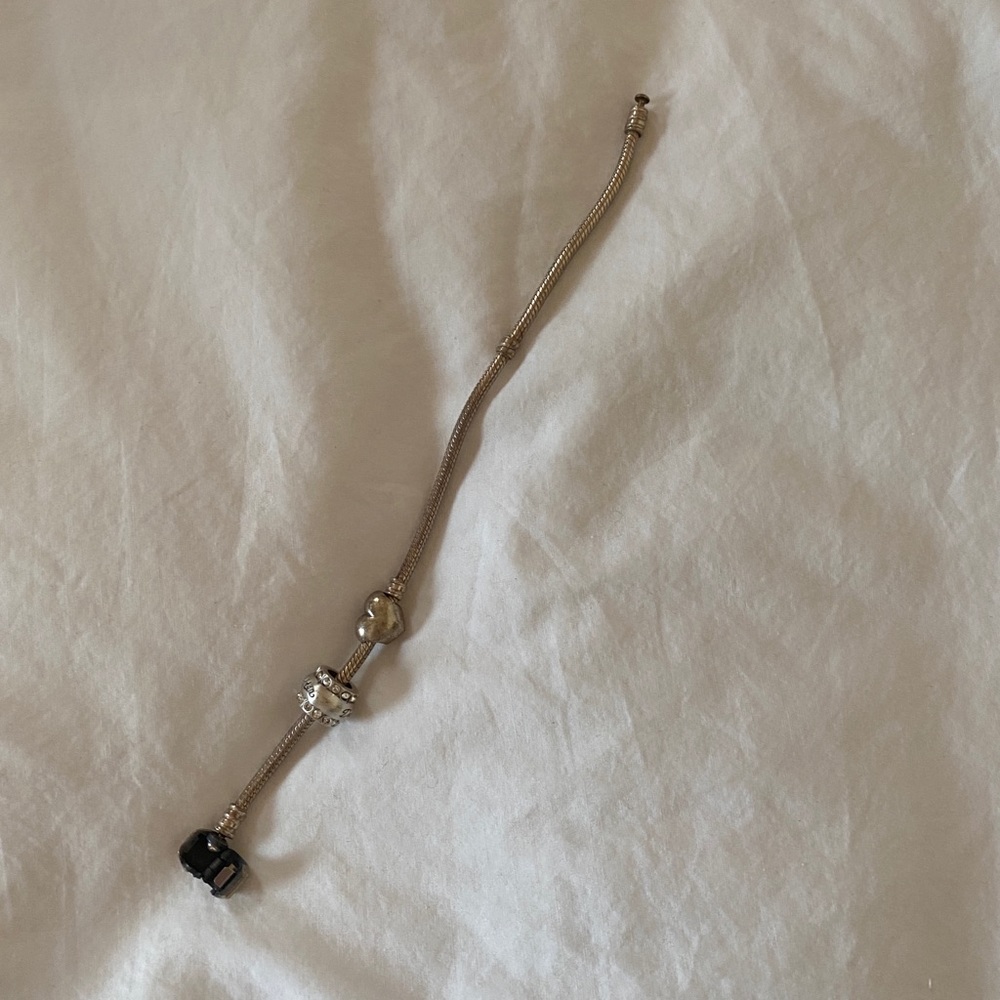 Pandora bracelet with two charms
